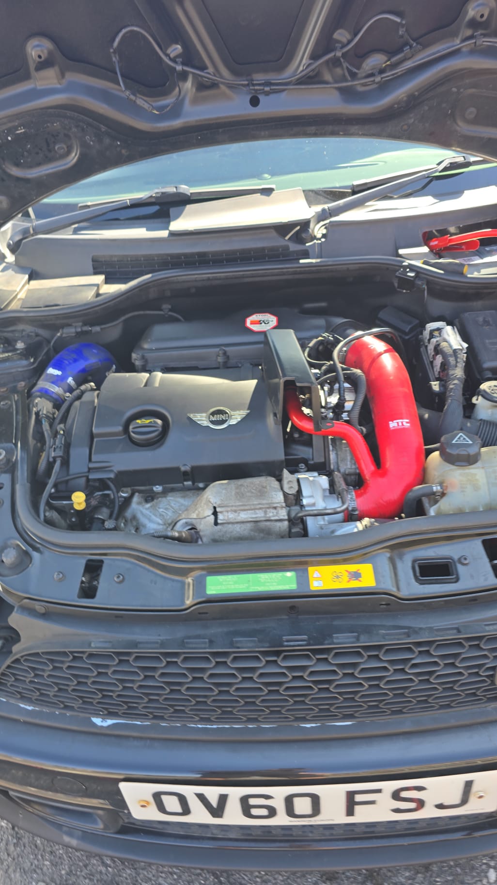 Mini Cooper S engine bay with uprated silicone induction and boost pipework before remapping