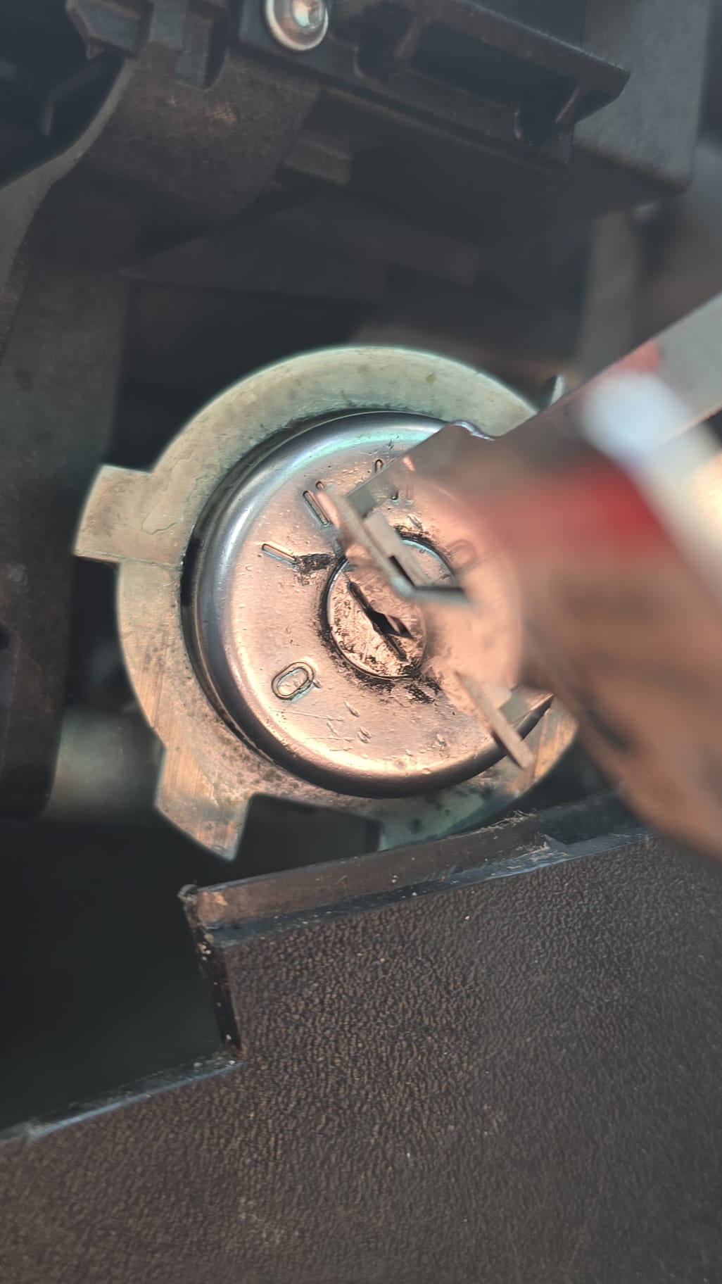 Worn Ford ignition barrel exposed during a mobile ignition lock repair